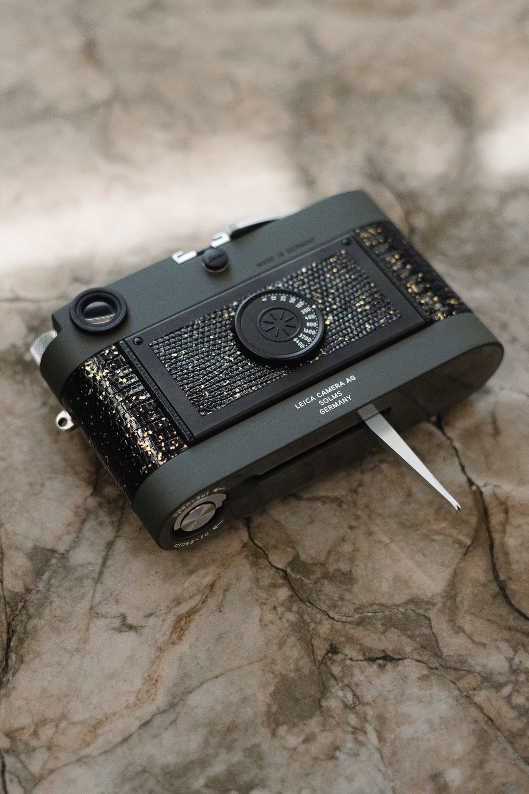 Leather art replacement with gold sprinkled lizard skin material/black