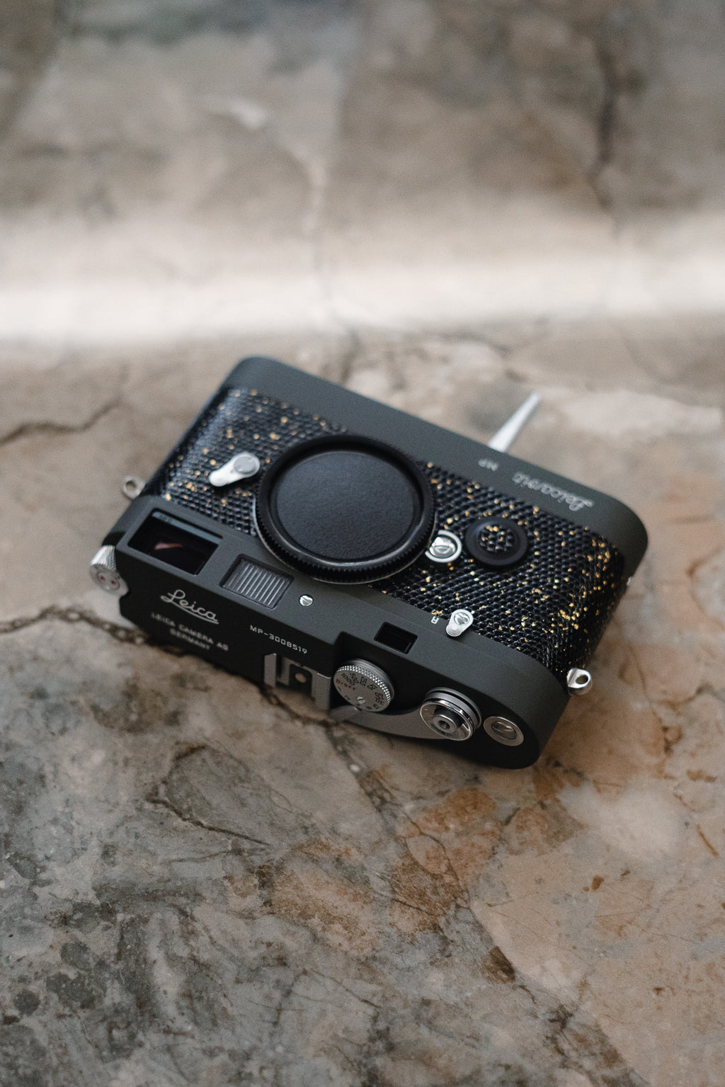 Leather art replacement with gold sprinkled lizard skin material/black